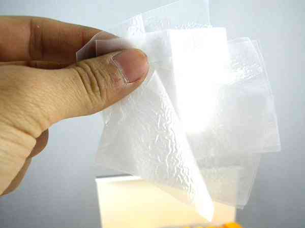 使用避孕膜时是放那张纸还是透明膜？